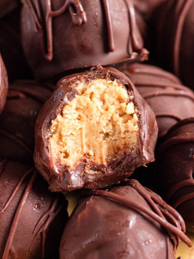 Peanut Butter Balls with Rice Krispies with a bite taken out.