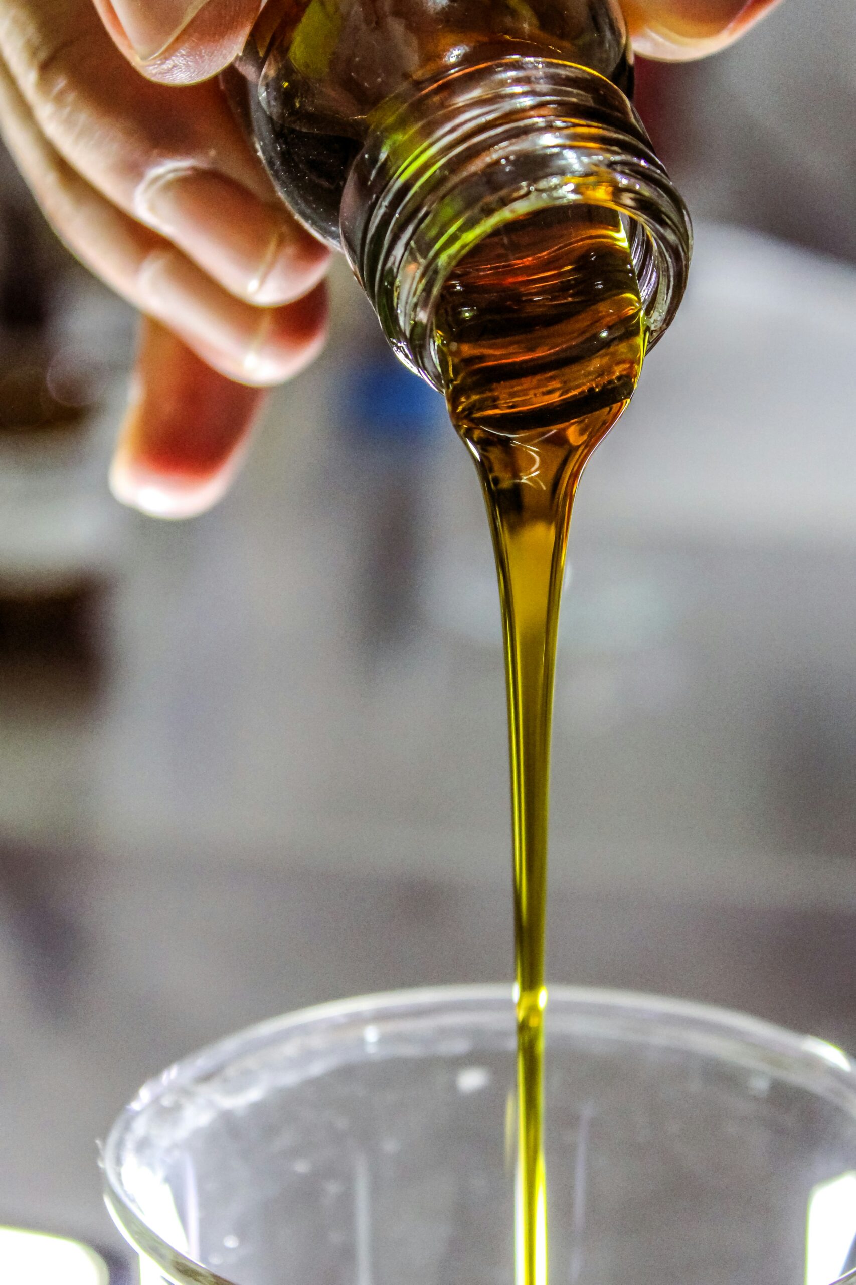 Pouring of olive oil.
